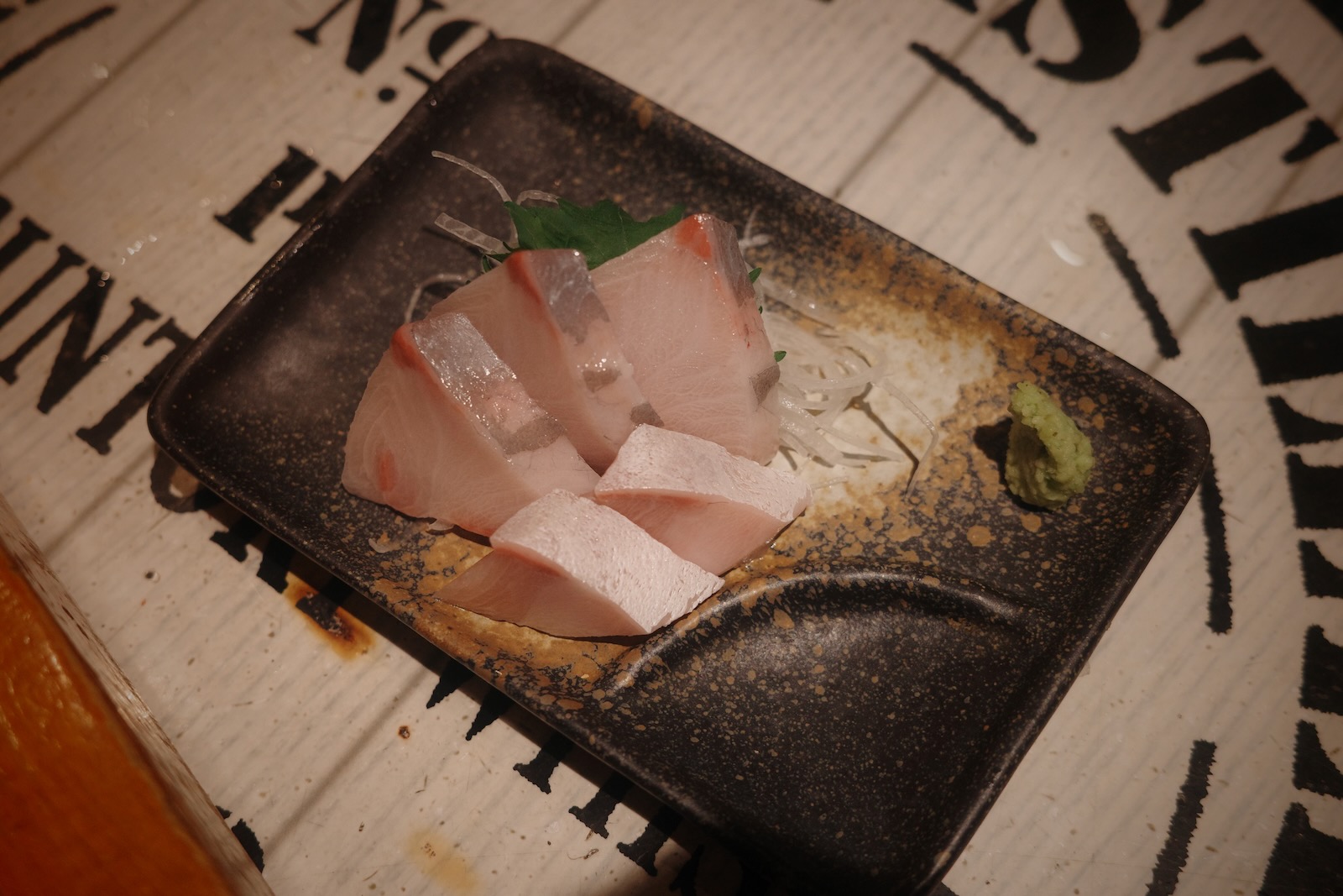 例の